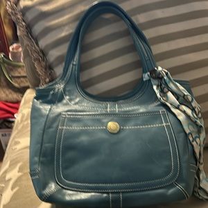 2 coach bags. Think they’re real. Pink and blue from poshmark poshers